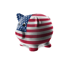 Image showing Ceramic piggy bank with painting of national flag 