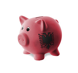 Image showing Ceramic piggy bank with painting of national flag 