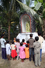 Image showing Group of young Bengali Catholics pray before a statue of the Blessed Virgin Mary, Basanti, West Bengal, India
