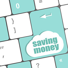 Image showing saving money for investment with a button on computer keyboard