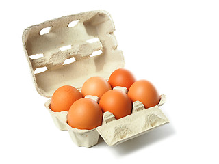 Image showing Box with eggs on white