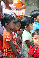 Image showing Group of young Bengali Catholics pray before a statue of the Blessed Virgin Mary, Basanti, West Bengal, India