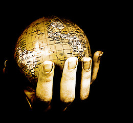 Image showing Globe in a girl's hands