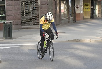 Image showing On bicycle