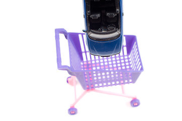 Image showing Car falling into shopping-cart