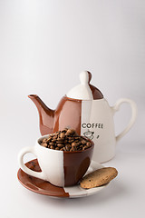 Image showing Cup of roasted brown coffee beans