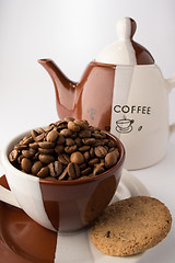 Image showing Cup of roasted brown coffee beans