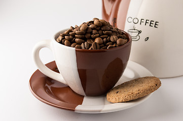 Image showing Cup of roasted brown coffee beans