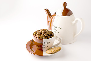 Image showing Cup of roasted brown coffee beans