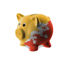 Image showing Ceramic piggy bank with painting of national flag 