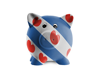 Image showing Ceramic piggy bank with painting of national flag 