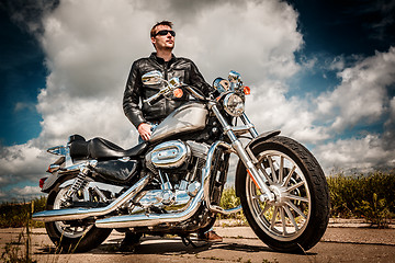 Image showing Biker on the road