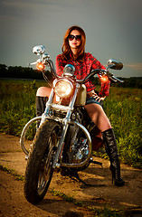 Image showing Biker girl and motorcycle