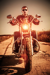 Image showing Biker on a motorcycle