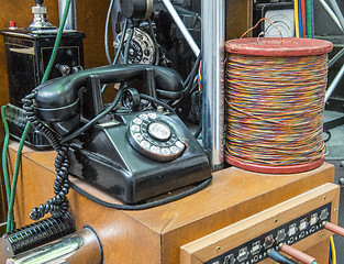 Image showing An old black telephone.