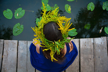 Image showing girl by the lake with a wreath on head