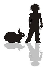 Image showing Child with a rabbit on a leash