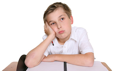 Image showing School boy lost in thought