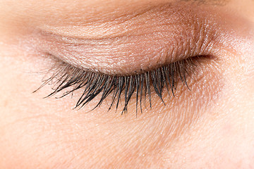 Image showing middle age woman eye macro