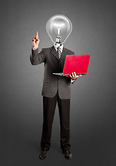 Image showing Lamp Head Business Man Shows Something With Finger