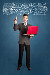 Image showing Business Man Shows Something With Finger