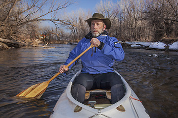 Image showing senior canoe paddler