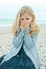 Image showing pretty girl at the autumn beach 