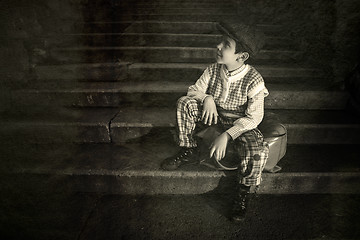 Image showing Exterior stairs and child with vintage bag