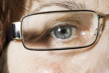 Image showing Close up old women eye and glasses