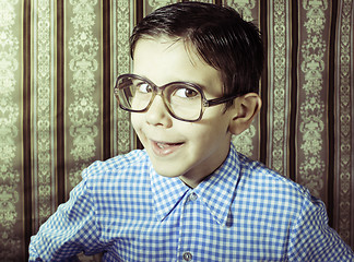 Image showing Smiling child with glasses in vintage clothes