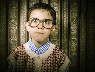 Image showing Smiling child with glasses in vintage clothes