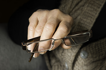 Image showing Women hand hold glasses