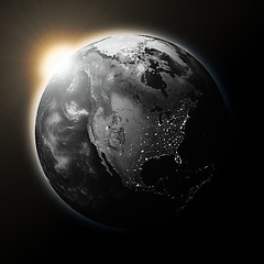 Image showing Sun over North America on dark planet Earth