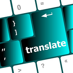 Image showing Multilingual translation on-line concept. Close up of multi language keyboard and translate word key