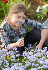 Image showing Girl in garden