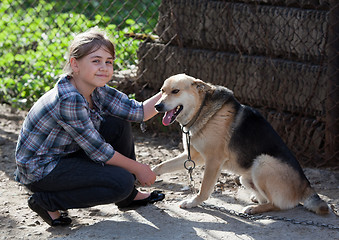 Image showing Girl with dog