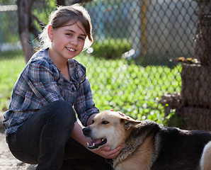 Image showing Girl with dog