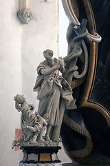 Image showing Moses lifts up the brass serpent