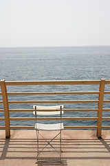 Image showing Chair facing the sea