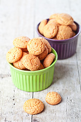 Image showing meringue almond cookies in bowls 