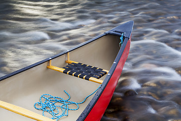 Image showing red canoe stern with a rope
