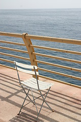 Image showing Chair facing the sea