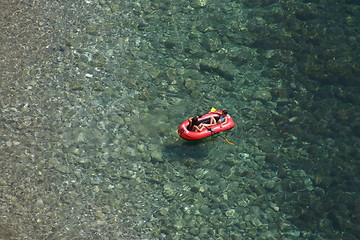 Image showing Children in a little boat