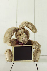 Image showing Teddy Bear Like Home Made Bunny Rabbit on Wooden White Backgroun