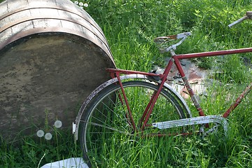 Image showing Red bike and barrel