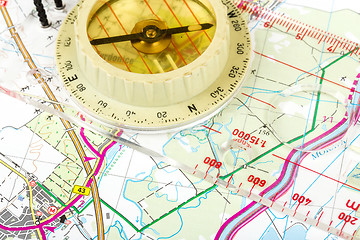 Image showing old touristic compass on map