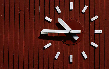 Image showing clock on wood