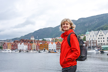 Image showing Woman tourist against cityscape of Bergen