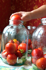 Image showing tomatos in jars prepared for preservation