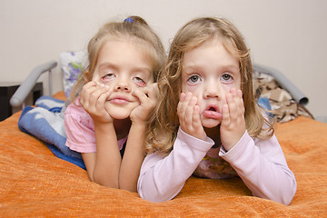 Image showing two girls pulled a terrible faces